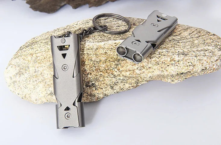 Metal keychain whistle with keychain ring in black and silver colour options