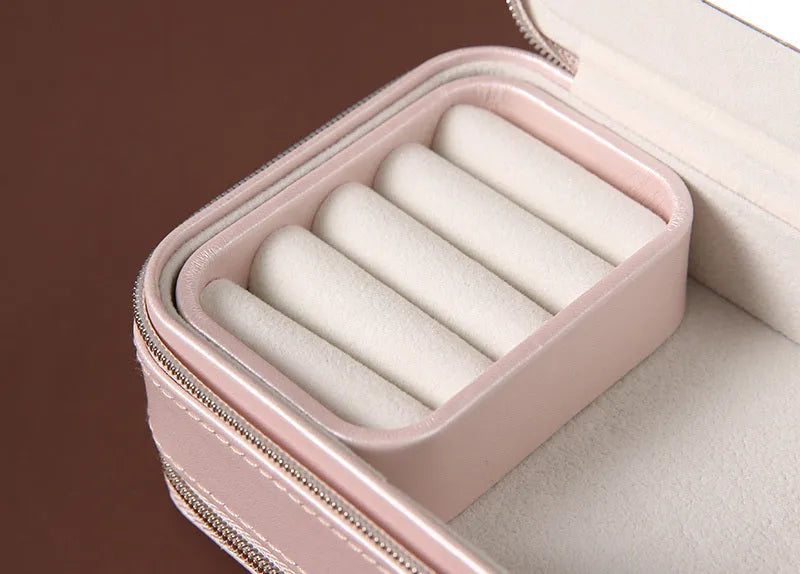 Portable double-sided travel jewellery box in blue with PU leather exterior and pearl velvet lining