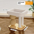 Pine wood cat scratching ball bed showing rounded design with textured scratching surface