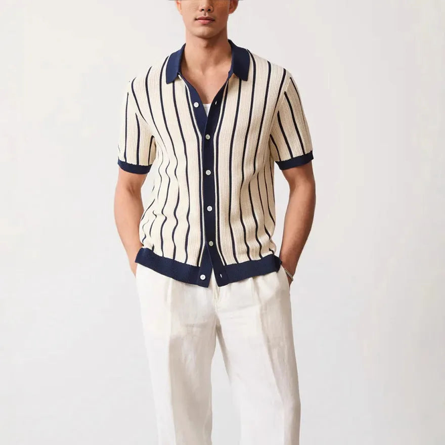 Men's white asymmetric knitted polo shirt with lapel collar and short sleeves.