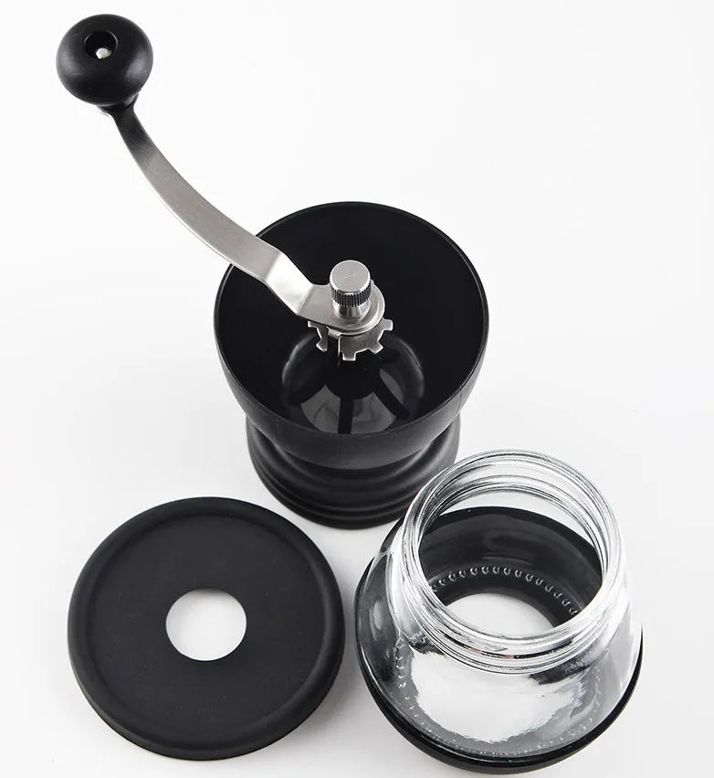 Beech wood hand grinder coffee machine with black finish, 88 mm wide, on a table
