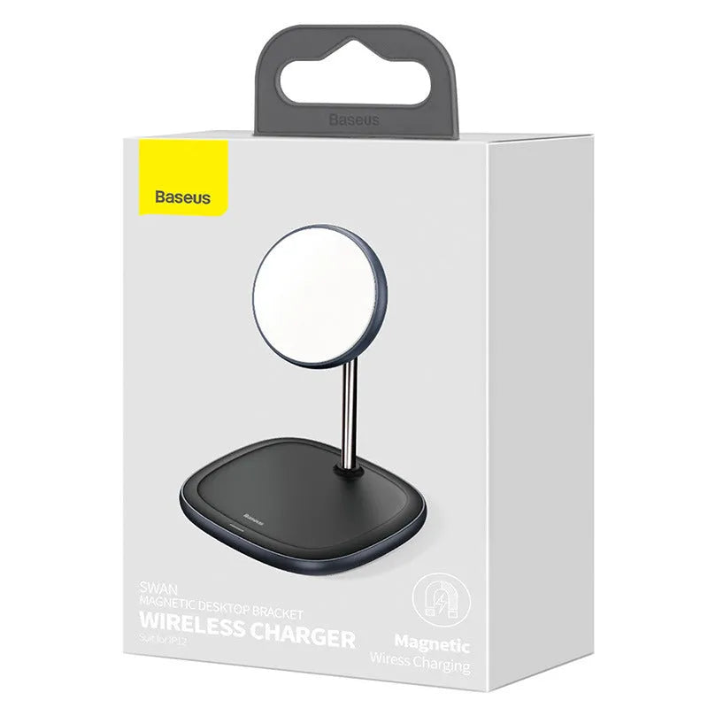 Black Swan magnetic wireless charging stand holding an iPhone 12 upright on a wooden desk.