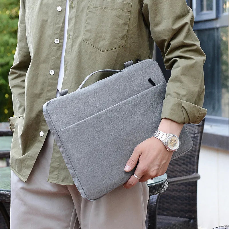 Oxford cloth laptop bag in solid colour with visible sewing thread detail, fits 11-16 inch laptops