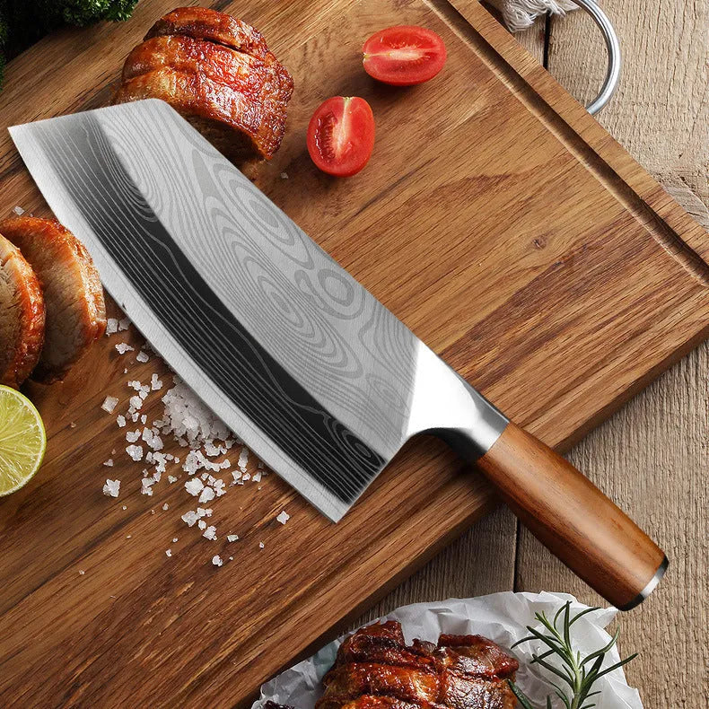 Stainless steel kitchen knife with a 320mm blade on a cutting board.