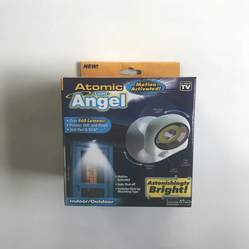 Atomic Angel white induction light with ABS plastic housing measuring 13.3 by 9.8 by 15.8 centimetres