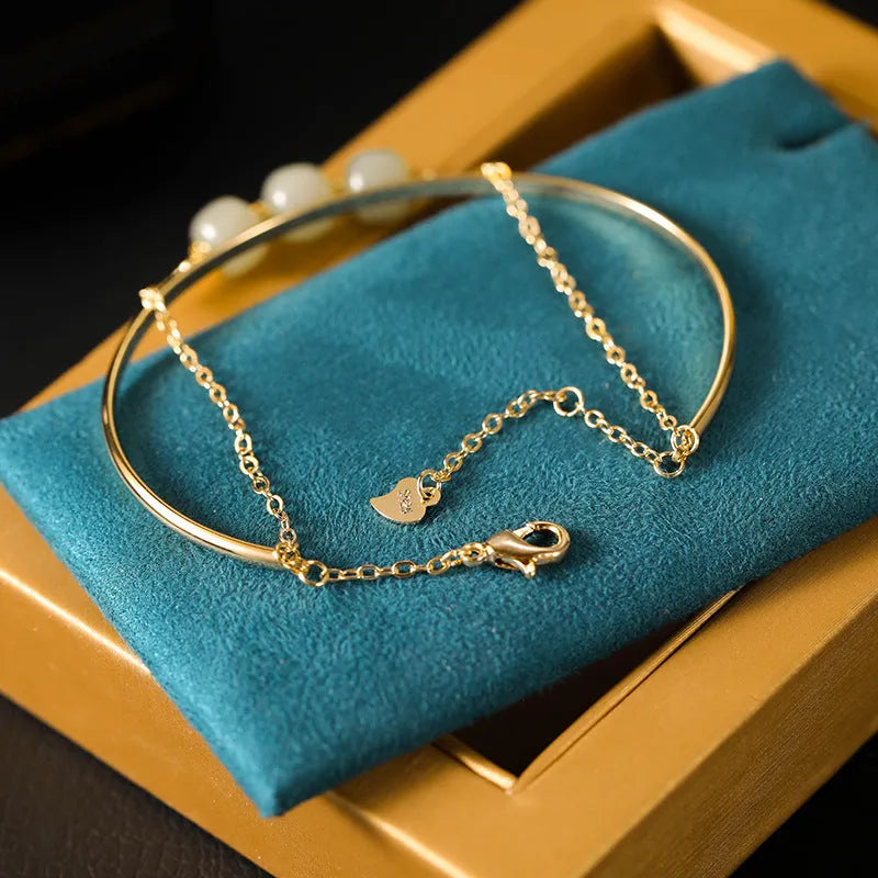 Women's Hetian jade lucky beads bracelet with gold inlay detailing in single, double and three bead versions