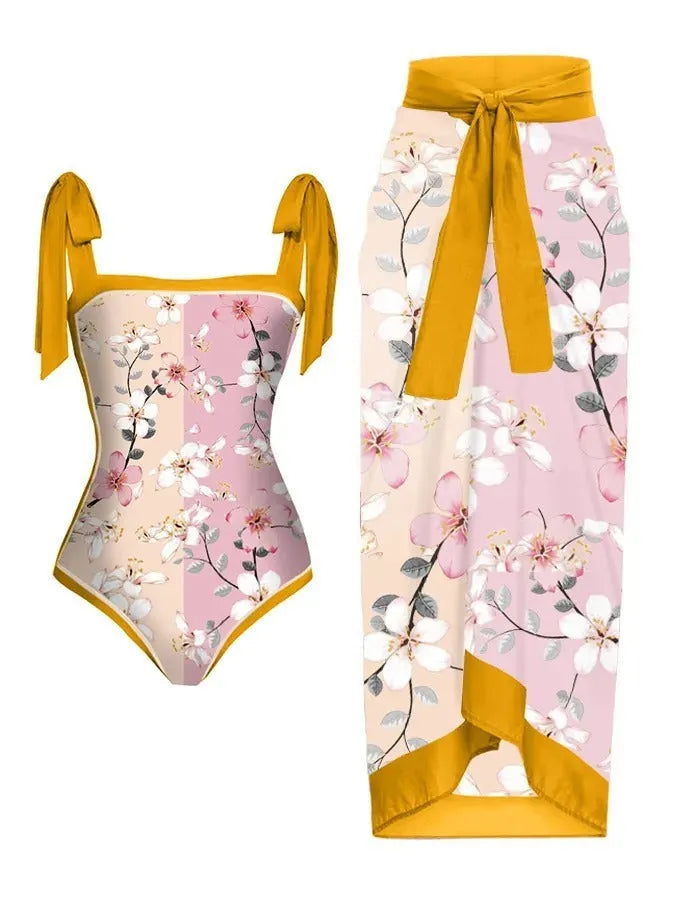 Women's floral printed chiffon two-piece swimsuit with attached skirt shown in one of 15 colour variations.