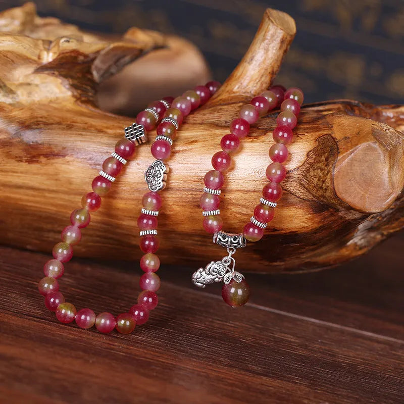 Handcrafted watermelon crystal bracelet with Chinese knot design in geometric shapes