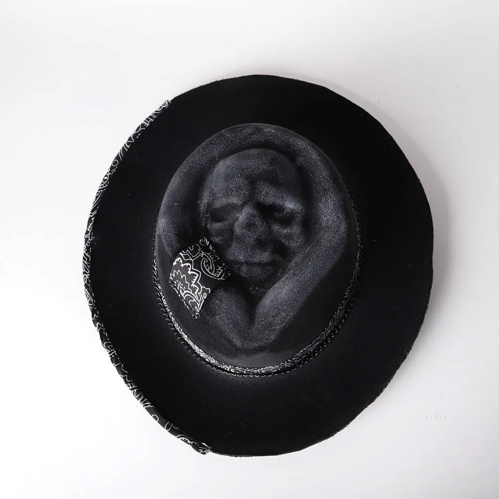 Handmade wool felt skull hat with a pointed conical crown for Halloween.