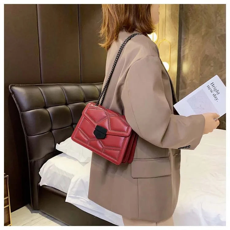 Small square PU shoulder bag with gold rivet studs, chain handle and zipper closure, available in four colours
