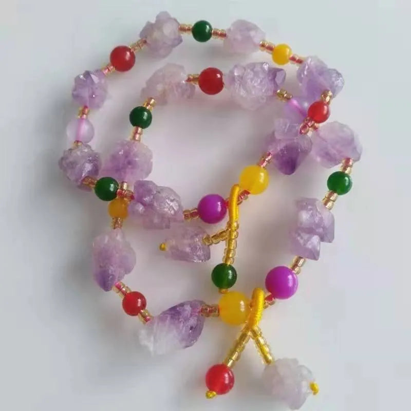 Natural purple amethyst bead bracelet for women with a silver Fu character charm.