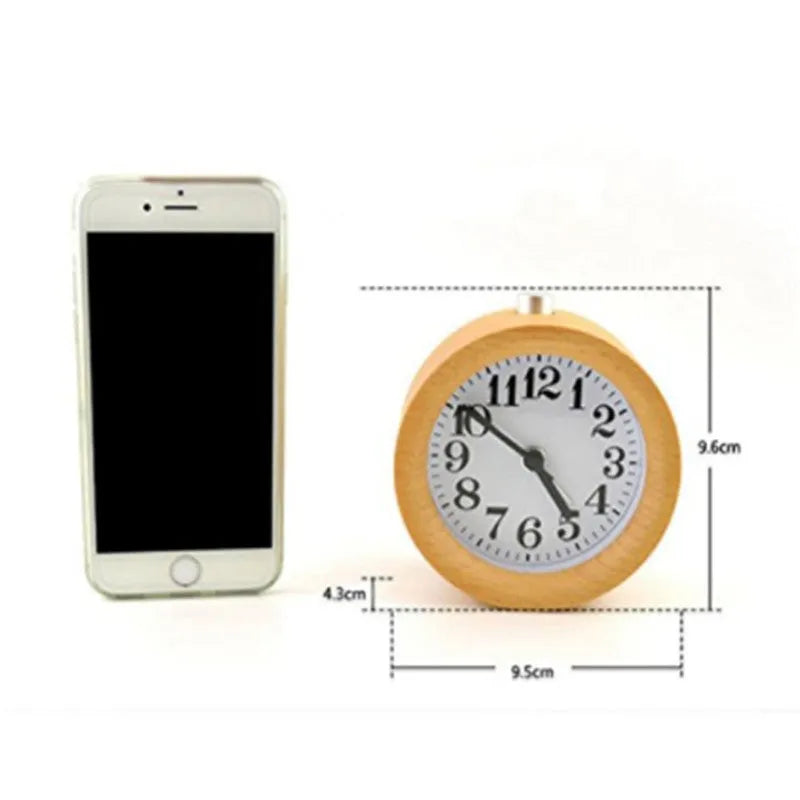 Solid beech wood silent snooze alarm clock showing wooden case and clear dial.