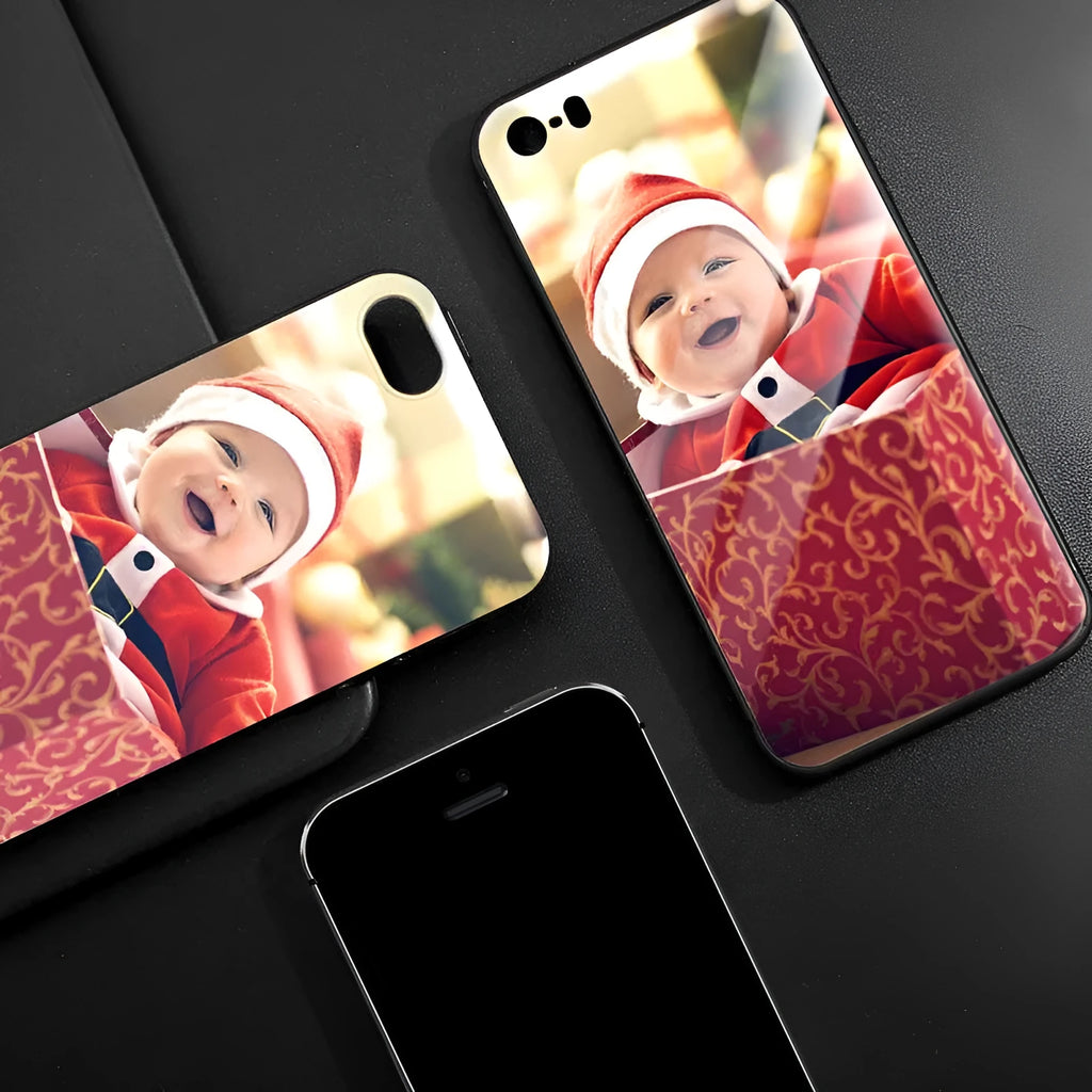 Slim hard back patterned case for iPhone with raised edge protecting camera and screen.