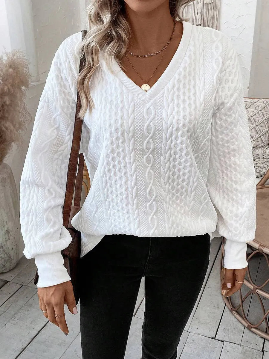 Milky white long sleeve T-shirt with 3D pattern design and loose fit silhouette