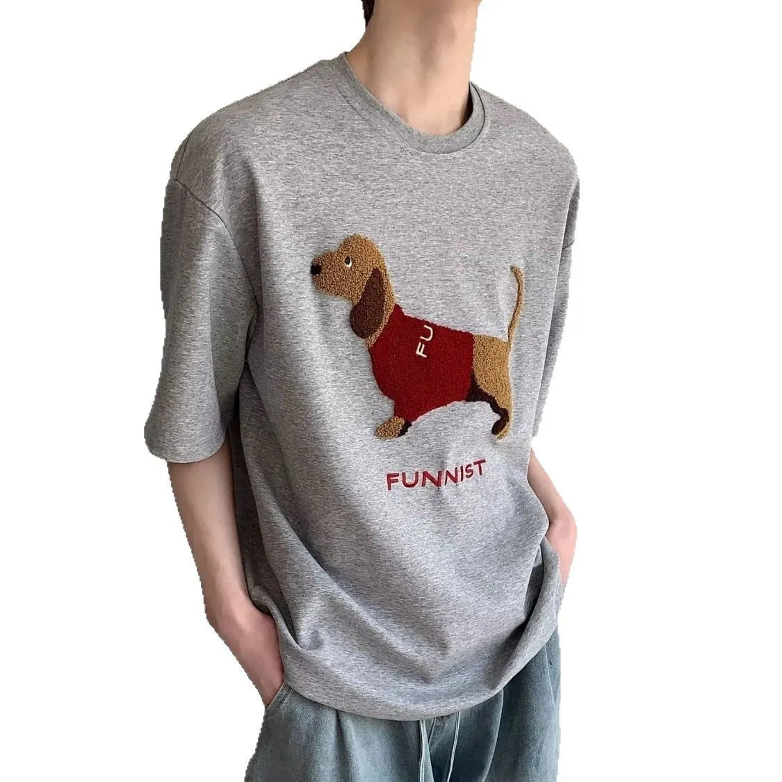 Men's grey cotton t-shirt with embroidered sausage dog and towel design showing round neck and short sleeves