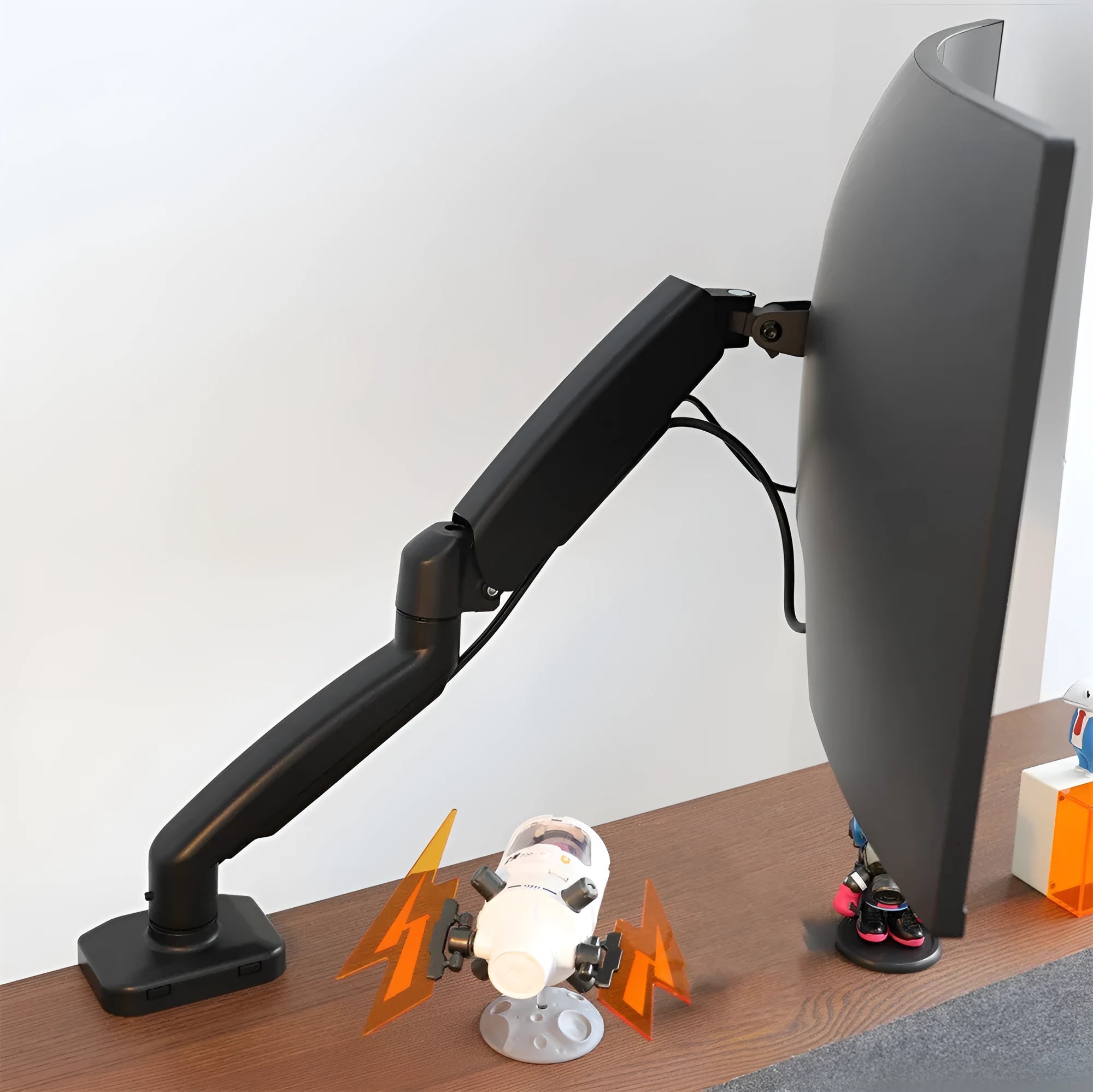 Black rotating telescopic LCD screen bracket elevated on desk with adjustable height and tilt