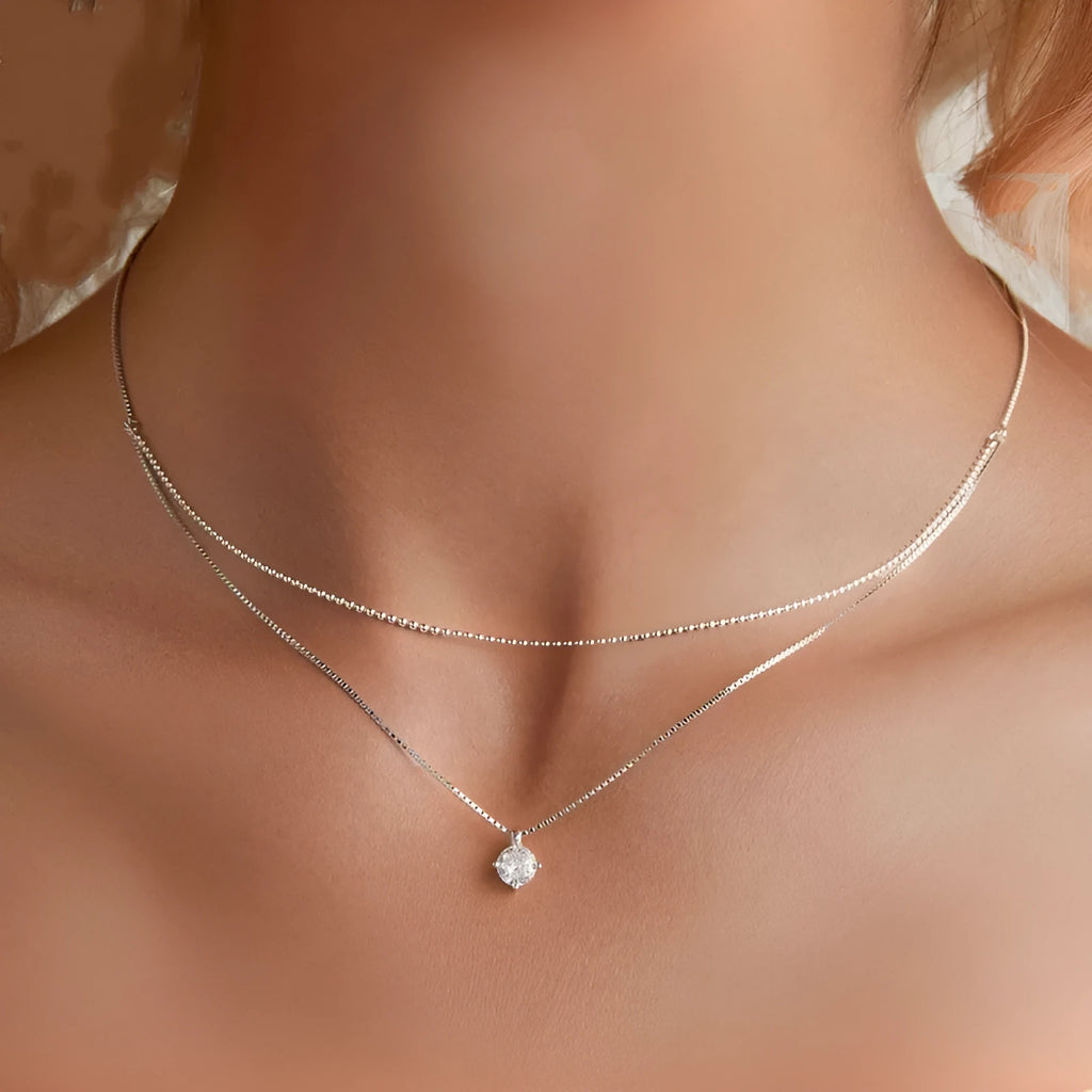 Sterling silver necklace with double-layer pendant and pearl chain style