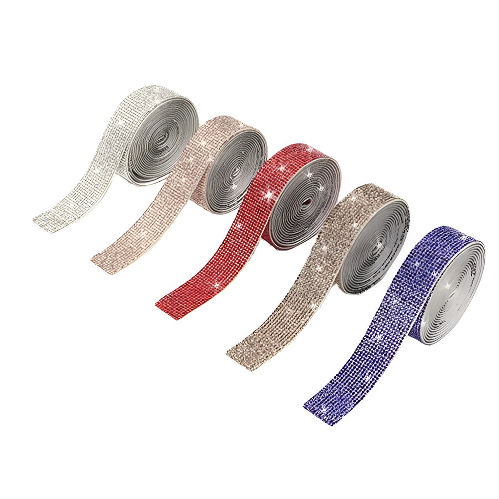 Self-adhesive water drill strip for clothing decoration in white and AB colour on a fabric background.