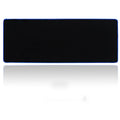 Black non-slip rubber cloth gaming keyboard pad on desk with keyboard and mouse