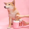 Pet paw washer in sky blue with silicone brush, showing compact ABS plastic build for dog or cat paw cleaning.