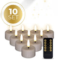 Four taupe coloured S10 LED tealight candles with a realistic 3D flame effect, showing scale.