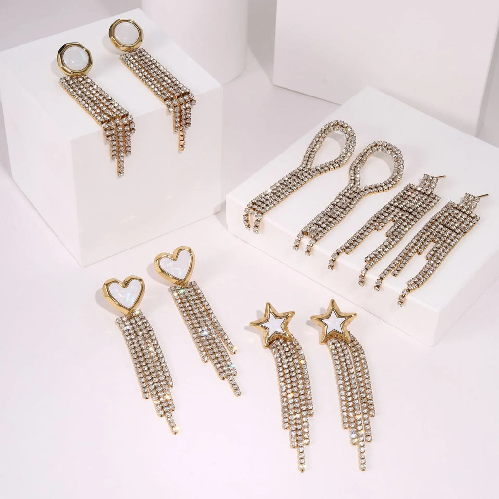 Pair of 18K gold plated stainless steel earrings featuring heart and star shapes with diamond tassels