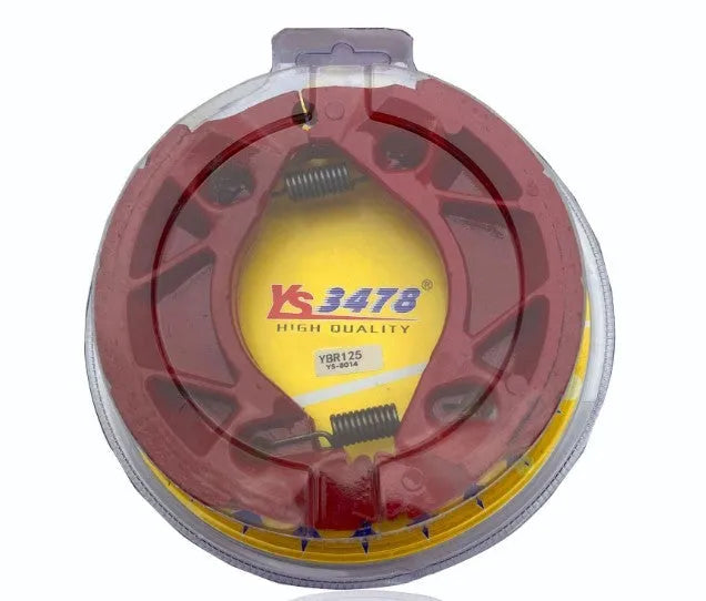 YBR125 motorcycle brake rubber block in black and red with metal backing