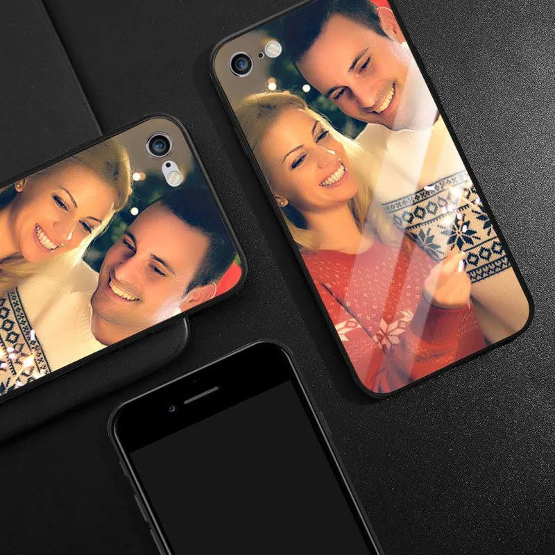 Slim hard back patterned case for iPhone with raised edge protecting camera and screen.