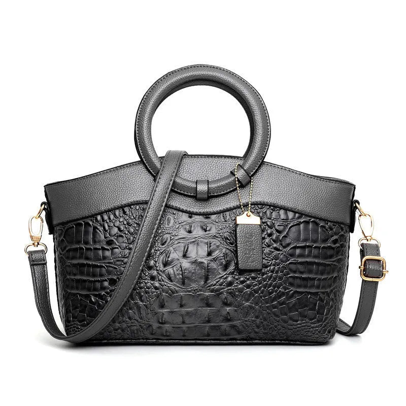 Fabric ladies handbag in multiple colours with zipper compartments and phone storage