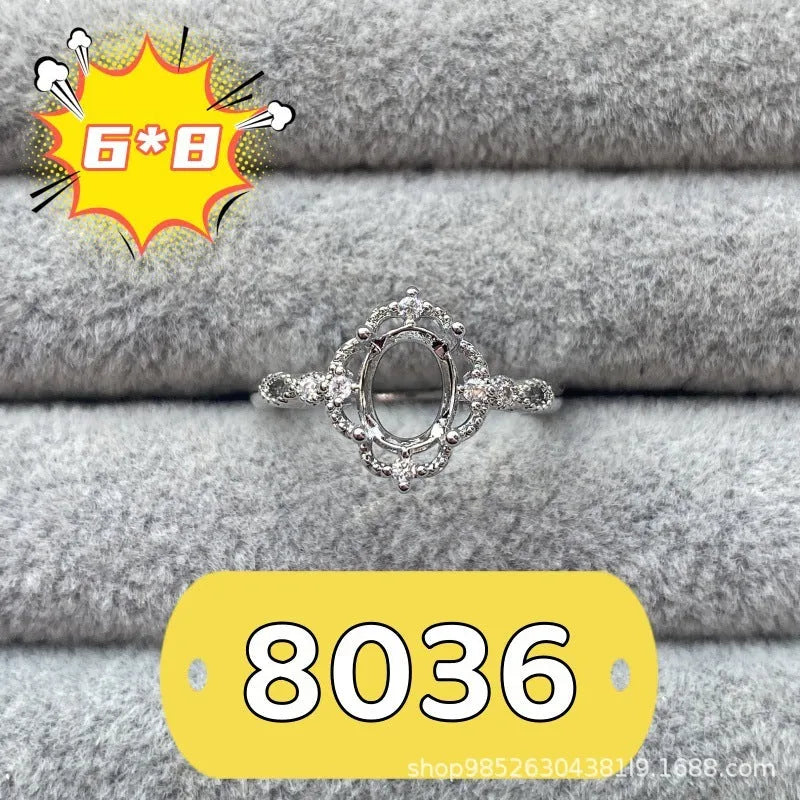 Korean style open mouth copper ring with 6x8mm oval denier stone and star decorations.