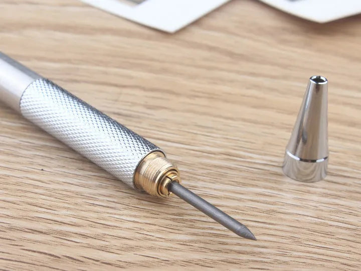 A metal automatic mechanical pencil with multiple lead size options including 0.5mm, 0.7mm, 0.9mm, 1.3mm, and 2.0mm.