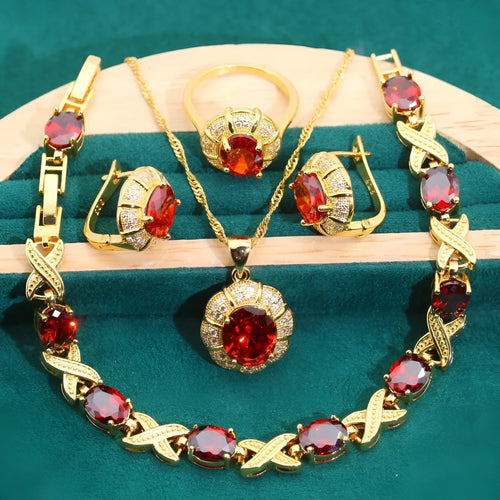 18k gold plated zircon jewellery set showing ring, earrings, bracelet and necklace in a coordinating colour.