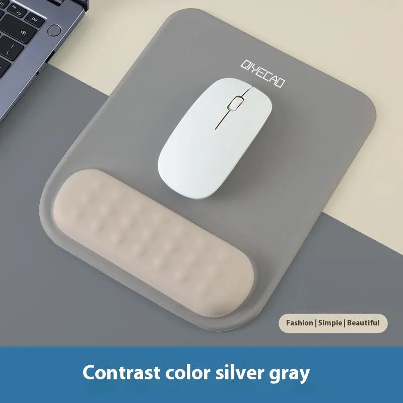 Ergonomic mouse pad with integrated wrist strap on cloth silicone surface
