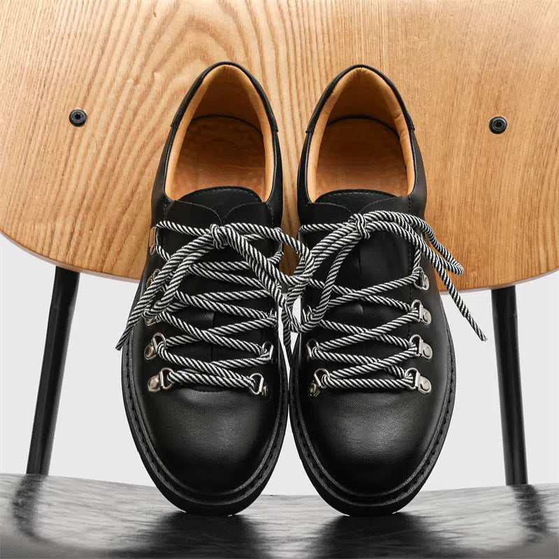 Men's outdoor casual shoes with rubber sole, striped pattern, and round toe in black colour