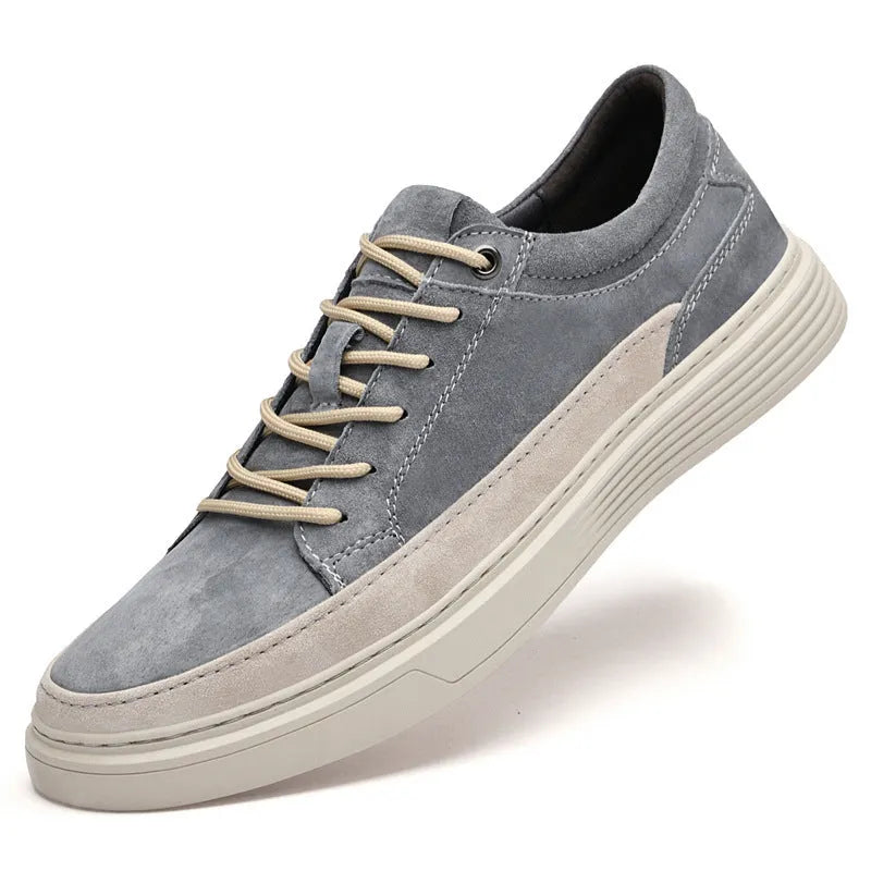 Men's grey casual leather skate shoes with rubber sole and lace-up design