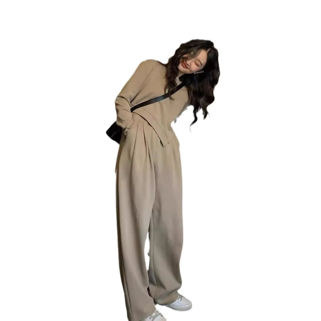 Women's brown loose-fit polyester sports suit set with long sleeves and full-length trousers.