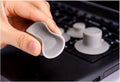 Grey laptop cooling pad set with four durable plastic pads for laptop temperature reduction