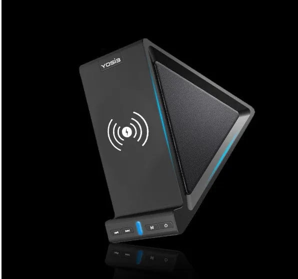Black multifunctional Bluetooth speaker with integrated wireless charging pad and phone stand.