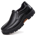 Men's black cowhide leather slip-on business casual shoes with a rubber sole