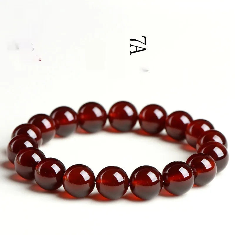 Natural orange red garnet crystal bracelet with Ruyi design elements in retro style