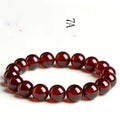 Natural orange red garnet crystal bracelet with Ruyi design elements in retro style