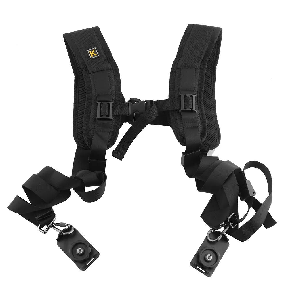 Black professional dual camera shoulder strap for SLR cameras shown on a person, highlighting thick shoulder sponge and metal connectors.