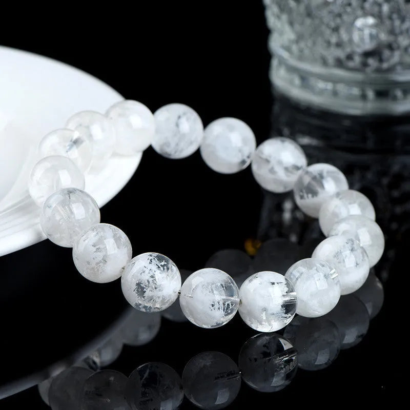 Women's crystal bracelet with matte blizzard-finished round beads and traditional Ruyi Xiangyun design.