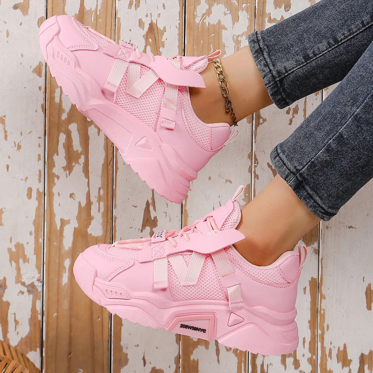 Women's platform mesh sneakers in purple, green, white, pink, and yellow colours with lace-up front.