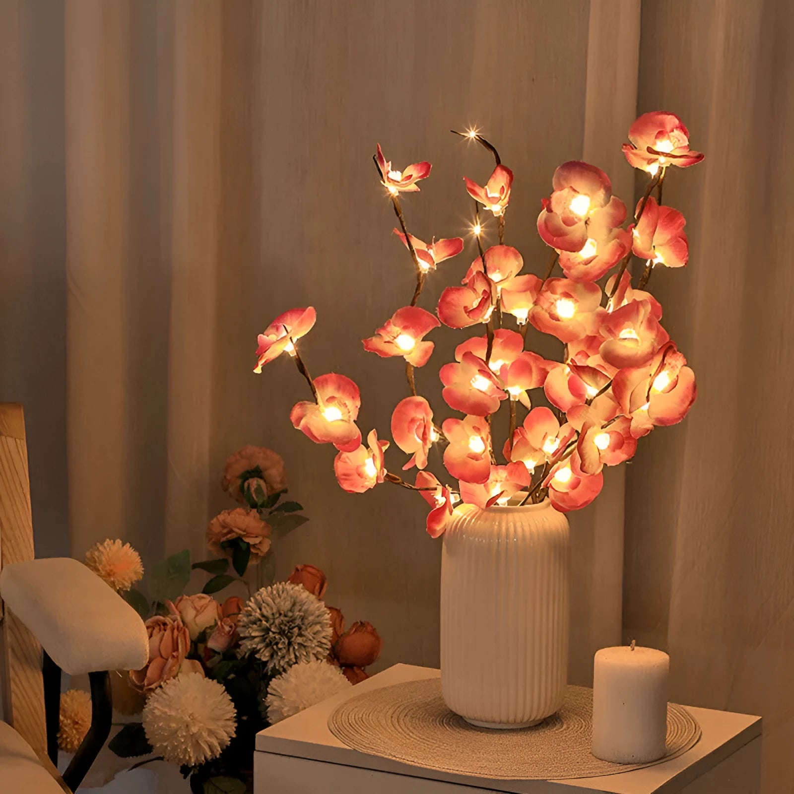 65cm tall pink LED phalaenopsis branch decorative light with fabric and plastic shell on bedside table