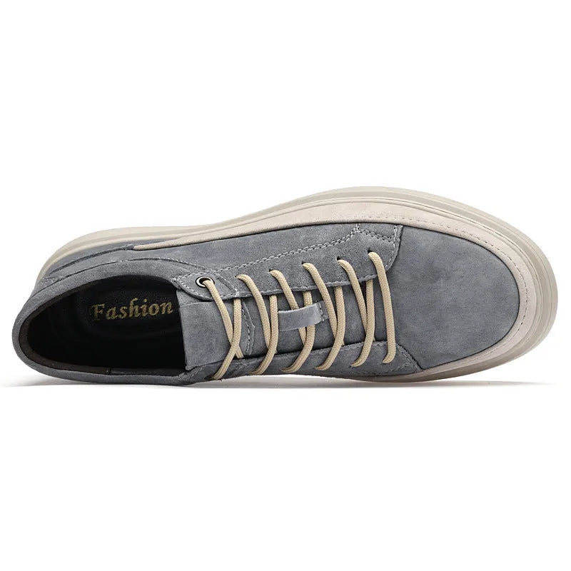 Men's grey casual leather skate shoes with rubber sole and lace-up design