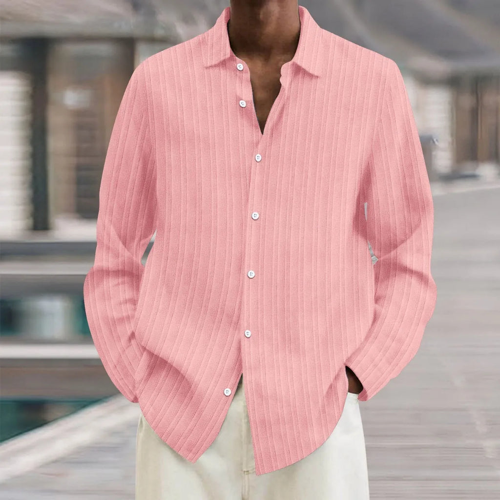 Man wearing a striped British style loose fit long sleeve cardigan shirt.