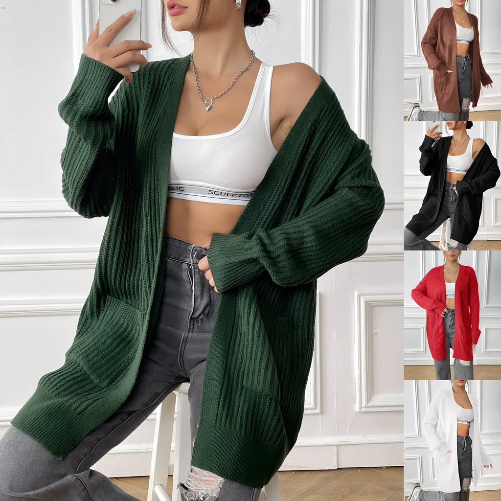 Women's dark green loose-fit acrylic cardigan with double pockets and long sleeves.