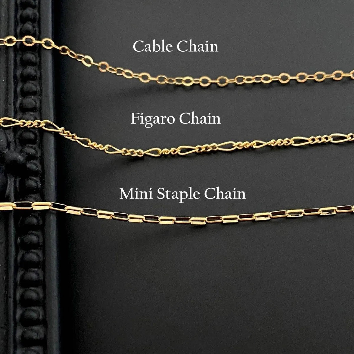 A ghost-themed pendant necklace on a twisted stainless steel chain, showing the titanium steel pendant detail.