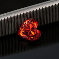 Colourful heart-shaped moissanite stone in lemon yellow, red, pink, blue and purple colours